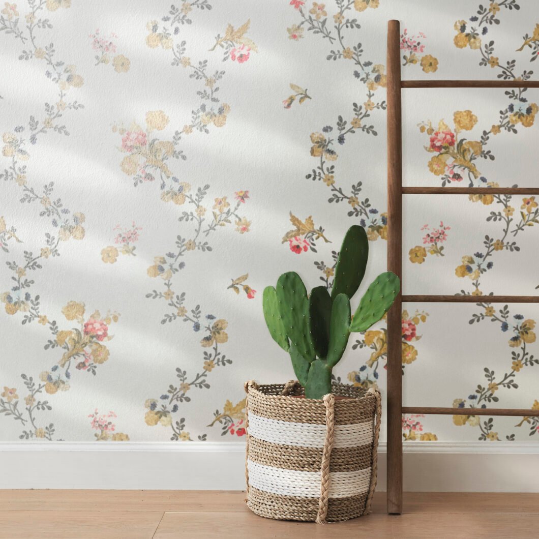 Rattan basket by a floral wall background