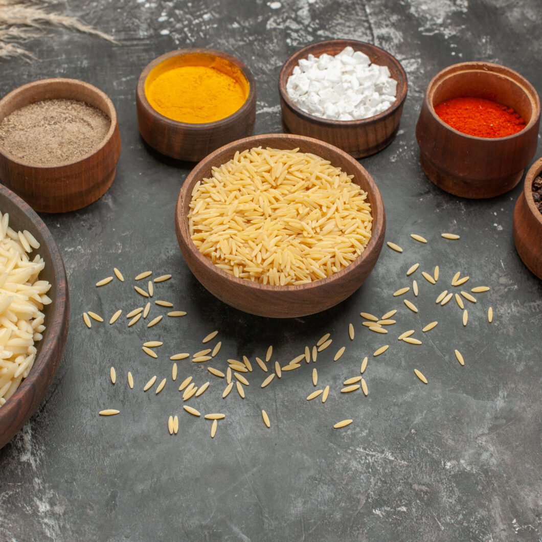 top-view-plain-boiled-rice-with-different-spices